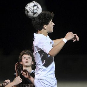 Bethel Park’s Xavier Jackson heads the ball against Latrobe during their WPIAL Class 3A quarterfinal last season.