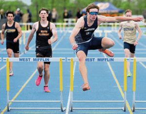 Norwin’s Ryan Schiller wins the 300-meters hurdles at the WPIAL Class 3A team track championships May 6.