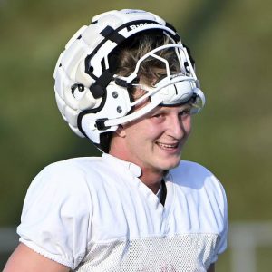 Peters Twp. quarterback Nolan DiLucia smiles between drills during practice on Wednesday, Aug. 6, 2025, at Peters.
