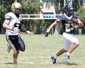 Riverview’s Kaden Levy outruns Valley’s Jaden Wall during a 6-yard touchdown Saturday.