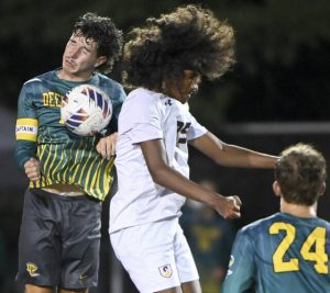 Deer Lakes’ Zane Spence battles Shady Side Academy’s P.K. Amos-Abanyie for possession during their game on Thursday, Aug. 28, 2025, in West Deer.