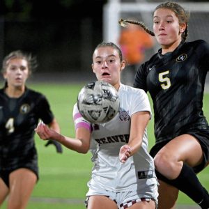 Quaker Valley’s Mia Duckstein (right) had two goals in a season-opening win over OLSH.