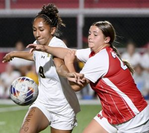 North Allegheny’s Avery Ruffus battles North Hills’ Emma Culver for possession during their game on Wednesday, Sept. 3, 2025, at Martorelli Stadium.