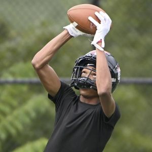 Aliquippa receiver Qa’lil Goode catches a pass during a preseason practice.