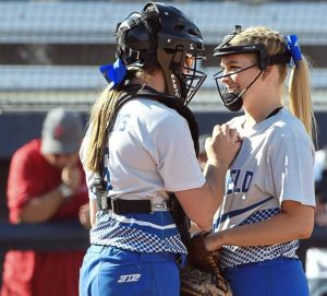 Former Hempfield pitcher Maddie Uschock (right), shown in 2018, will coach Franklin Regional softball this spring.
