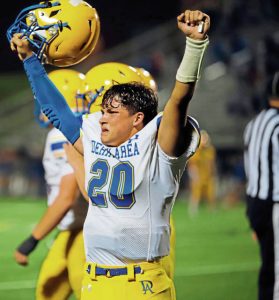 Derry quarterback Anthony Sacco celebrates beating Deer Lakes on Friday.