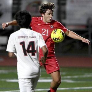 Peters Township’s Colin Froelich works to score against Upper St. Clair last season.