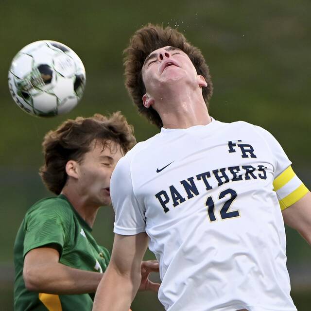 Franklin Regional’s Cruise Lamanna battles Penn-Trafford’s Brennen Neubauer for a header during their game on Tuesday, Aug. 26, 2025, in Harrison City.