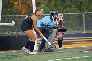 North Allegheny junior Grace Zahorchak (middle), a converted midfielder, allowed one goal in her first three starts for the Tigers’ field hockey team after injuries moved her into the cage. She is flanked by <span data-olk-copy-source="MessageBody">senior </span>defender Fiola Ragan (left) and sophomore defender Cailyn Graham.