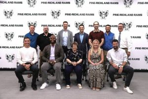 Inductees of the Pine-Richland Athletic Hall of Fame Class of 2025 are (standing) members of the 2006 baseball team and (seated from left) John Karr, Brandon Hunt, Janet Chappell, Brittany Piskur (Adams) and Ben DiNucci.