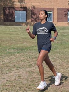 Plum senior Mayah Torres runs at practice on Sept. 10 at Plum High School.