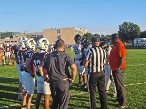 Captains for Greensburg Central Catholic and Clairton meet before their game Friday, Sept. 12, 2025.