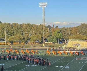Latrobe band members and cheering squads await the Wildcats’ entrance for their football game against Franklin Regional on Friday.