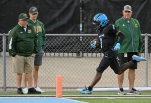 Woodland Hills' Scoop Smith cruises into the end zone against Penn-Trafford on Friday, Sept. 12, 2025, at the Wolvarena.