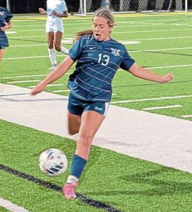 Freeport’s Nia DiSanti plays the ball against Burrell on Monday.