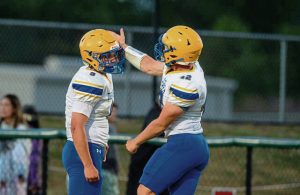 Derry’s Max Doherty and Preston Donovan celebrate after scoring a touchdown against Freeport on Aug. 29.