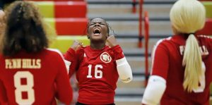 Penn Hills junior setter KJ McGee celebrates winning a point against Fox Chapel on Sept. 16.