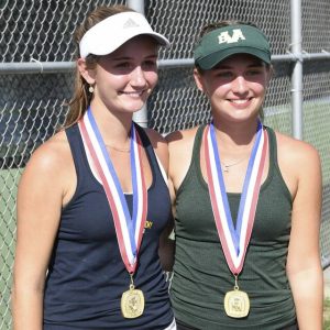 Shady Side Academy’s Meriwether McCargo (left) and Belle Vernon’s Gabriella Dusi stand together after winning gold at the WPIAL tennis singles championships Sept. 19, 2024.