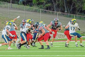 Southmoreland’s Dawson Wolfe looks for running room against Ringgold on Friday.
