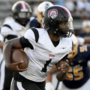 Aliquippa quarterback Marques Council carries against Mars on Friday, Sept. 12, 2025, in Adams.