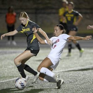 Moon’s Kendall Dydek shoots around Montour’s Emily Rishell to score during their game on Wednesday, Sept. 17, 2025, in Robinson.