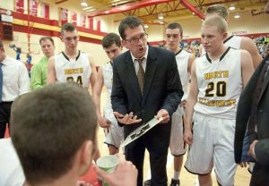 North Allegheny coach Dave DeGregorio talks with his team during a 82-59 victory over Hempfield in the WPIAL 2014 Class 4A quarterfinals at Penn Hills.