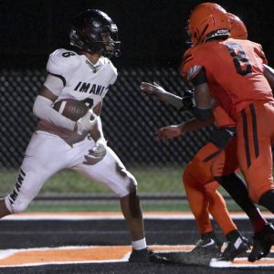 Imani Christian’s Dajuan Craighead scores against Clairton during the fourth quarter Aug. 22 at Tyler Boyd Stadium.
