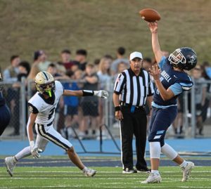 Burrell quarterback Antonio Perkins heaves a deep pass against Freeport on Friday, Sept. 19, 2025, at Burrell High School.
