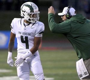 Pine-Richland’s Jay Timmons celebrates his touchdown with head coach Jon LeDonne during their game against Central Catholic on Friday, Aug. 29, 2025, at CMU.