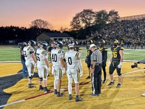 Central Catholic and North Allegheny captains await the coin toss before their game Sept. 26, 2025, at North Allegheny.
