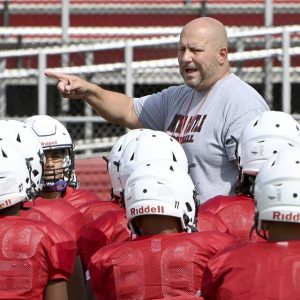 New Castle head coach Fred Mozzocio talks with his team during practice on Thursday, Aug. 7, 2025, at Taggart Stadium in New Castle.