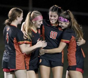 North Catholic’s Anna Francesca Liberati (10) celebrates her goal with teammates during their game against Burrell on Monday in North Park.