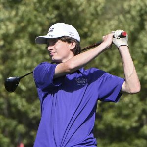 OLSH’s Jonah Schollaert watches his tee shot on No. 17 during the WPIAL Class 2A boys golf championship last year at Sewickley Heights Golf Club.
