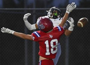 Mt. Pleasant’s Robert Hixson breaks up a pass intended for Greensburg Central Catholic’s Samir Crosby on Aug. 29.