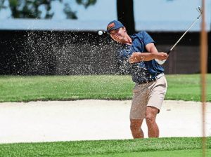 Nick Turowski hits out of a fairway bunker on the first hole during the 2024 WPGA Amateur Championship at Chartiers Country Club