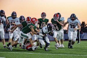 Southmoreland running back Averyon Darnell (4) tries to break through the Yough defense Friday night.