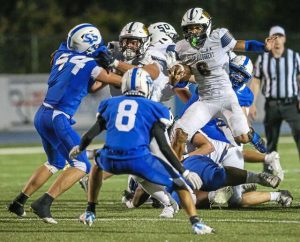 South Allegheny’s Joey Gamret hurdles a South Park defender during their game Sept. 19. South Allegheny is No. 1 in Class 2A.