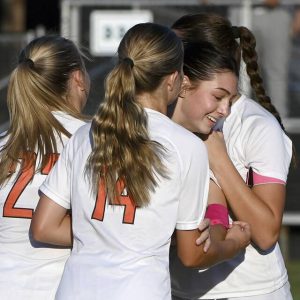 Springdale’s Hailey Marchlewski is mobbed by teammates after scoring during their game against Riverview on Thursday, Sept. 11, 2025, in Oakmont.