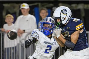 Hempfield’s Terrance Vaughns (left) defends on a pass intended for Norwin’s Potter Brozeski last Friday.