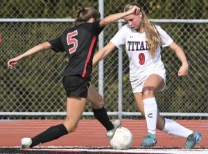 Fox Chapel’s Gemma Levy defends on Shaler’s Naudia Zotter on Sept. 22.