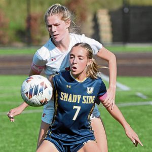 Shady Side Academy’s Ella Van Norman battles North Catholic’s Reagan Young for possession on Sept. 15.