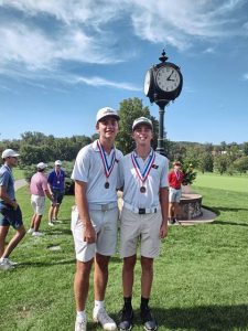 Riverview juniors Rex Roberts (left) and Ian Stempfer celebrate with their WPIAL medals after qualifying for states at the WPIAL Class 2A individual golf championships Sept. 30 at Valley Brook Country Club.