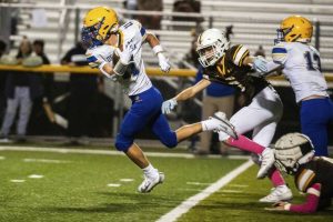 Derry’s Karsen Weiers breaks away from the Greensburg Salem defense Friday.