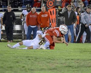 Riverview's Lukas Duncan brings down Frazier's Derek Diamond during their game Friday.