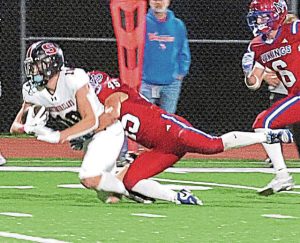 Mt. Pleasant’s Stephen Predajna (45) tackles Southmoreland’s Elliot Premus (10) during their game Oct. 11, 2024, at Mt. Pleasant.