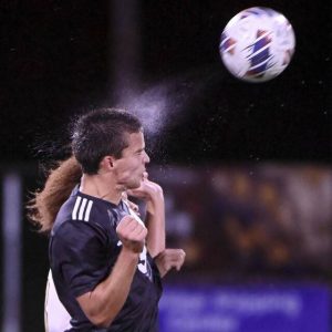 Quaker Valley’s Levi Carver heads the ball against Hopewell on Tuesday, Oct. 7, 2025, in Leetsdale.