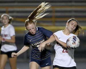 Peters Township’s Marina Hajnosz battles Mt. Lebanon’s Ava Heidenreich for possession during their game on Monday, Oct. 6, 2025, in Mt. Lebanon.