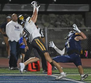 North Allegheny’s Mason Brown pulls in a touchdown pass over Norwin’s Jake Knight on Sept.19.