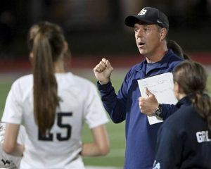 Franklin Regional head coach Scott Arnold talks with his team during halftime on Monday, Aug. 25, 2025, at Plum.