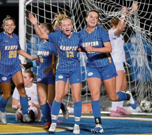 Hampton’s Esme Farmakis (13) celebrates with Harper Gibbons after Gibbons scored during their game against Mars on Aug. 27 at Fridley Field.